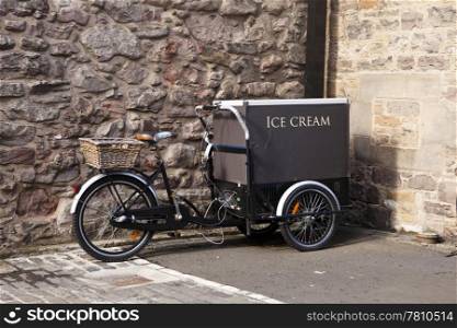 An ice cream cart is built on a bicycle in Edinburgh.