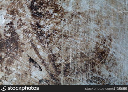 An image of a background of scratched rusty metal