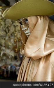 An image of a mannequin in venetian clothing