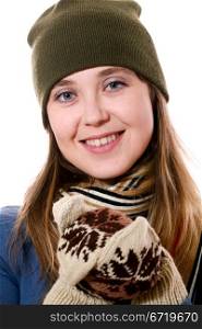 An image of a smiling girl in mittens with pattern
