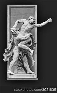 An image of a statue in Vienna Hercules and Antaeus fighting