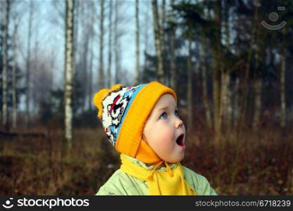 An image of a surprised girl in the park