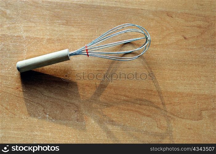 An image of a whisk on the kitchen table