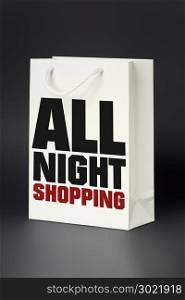 An image of a white shopping bag all night shopping