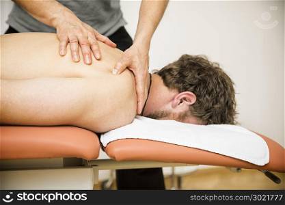 An image of a young man at the physio therapy