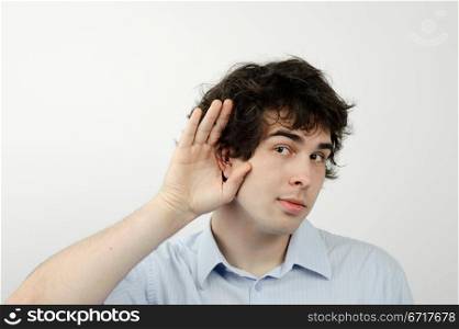An image of a young man listening to something