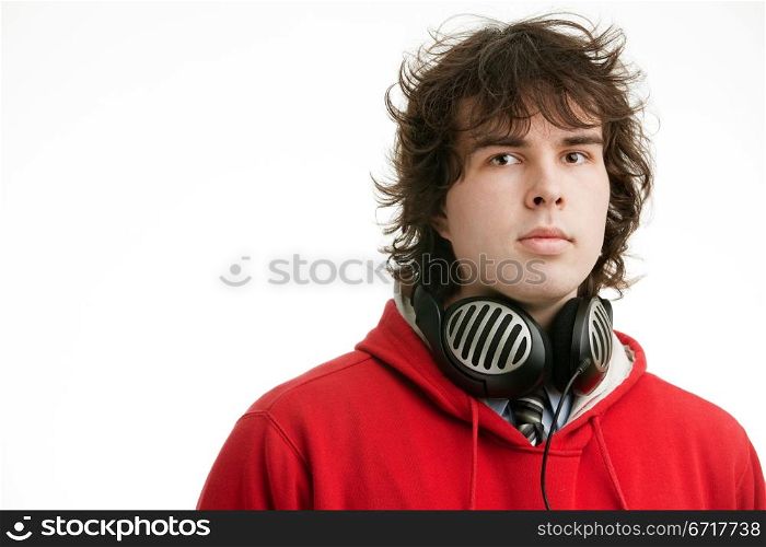 An image of a young man with big headphones