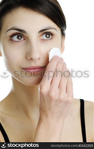 An image of a young woman with a sponge