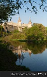 An image of beautiful medieval fortress and river