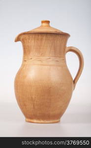 An image of ceramic jug on a white background