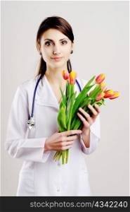 An image of doctor with tulips