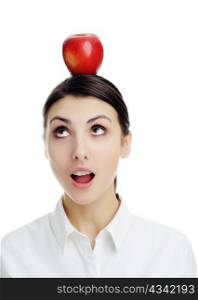 An image of girl with apple on her head.