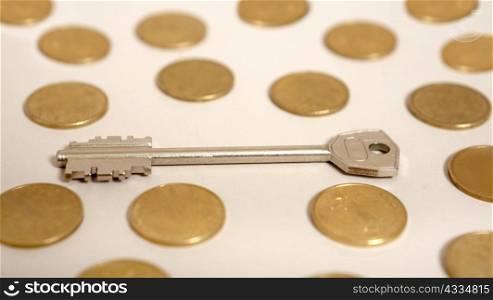 An image of gold and a key