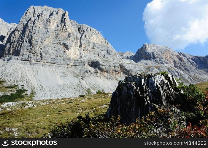 An image of grey cliffs and blue sky