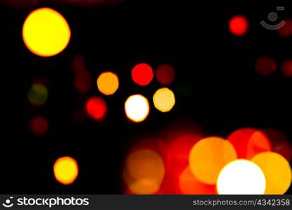 An image of multicoloured festive lights on dark sky