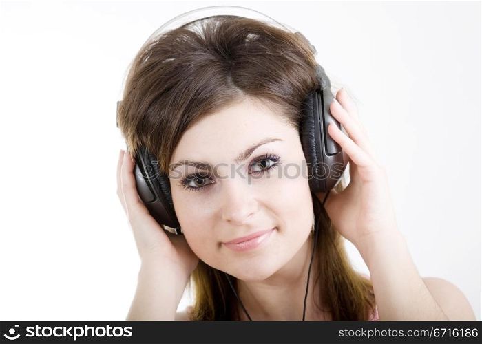 An image of nice woman listening to music