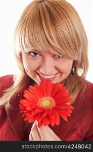 An image of smiling girl with red flower