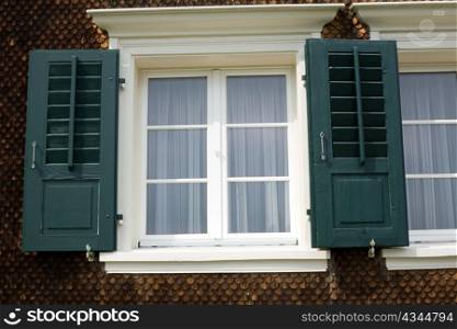An image of windows with jalousie