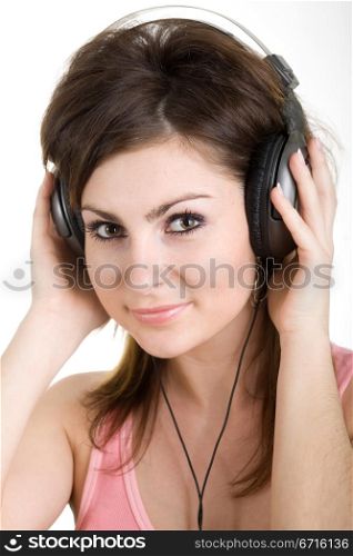 An image of woman in headphone