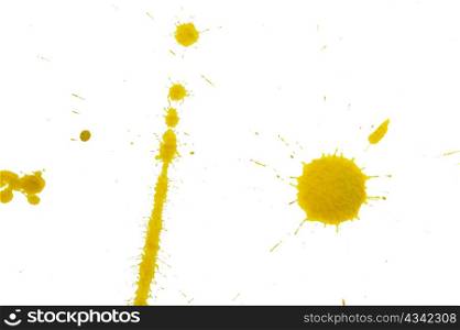 An image of yellow spots on white paper