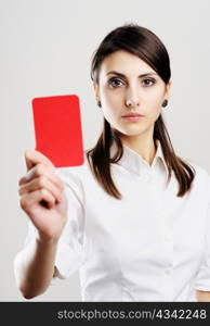 An image of young beautiful woman holding red card
