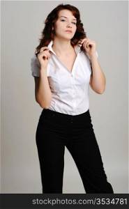 An image of young beautiful woman in white blouse