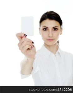 An image of young woman holding blank businesscard in hand. Focus on card