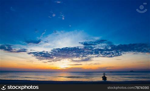 An impressive sunrise over the sea at Hua Hin beach, Thailand.