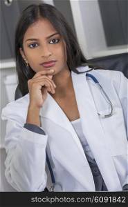 An Indian Asian female medical doctor thinking in her hospital office &#xD;