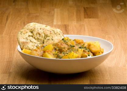 An Indian meal - Potato curry with Lentis and Naan bread