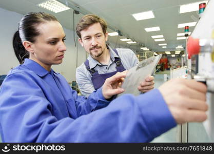 an industrial technicians checking machine