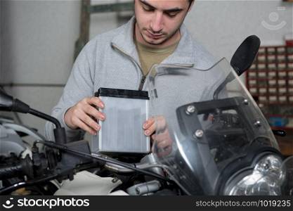 an installation of the motorbike battery