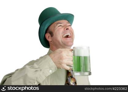 An Irish man on St. Patrick&rsquo;s Day, enjoying a green beer and a good laugh. Isolated on white.