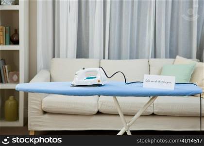 An iron and ironing board