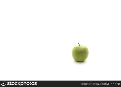 An isolated green apple on white background