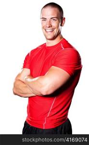 An isolated portrait of a smiling muscular caucasian athlete