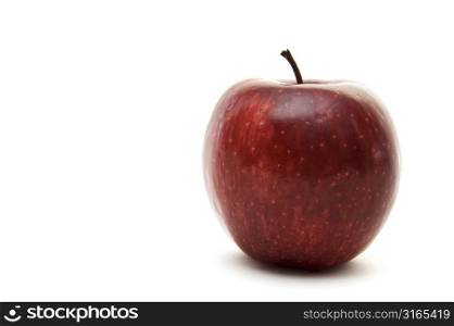 An isolated red apple on white background