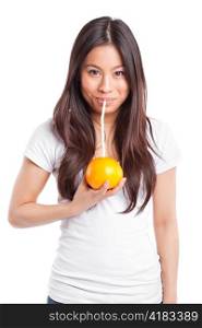 An isolated shot of a beautiful asian woman drinking orange juice