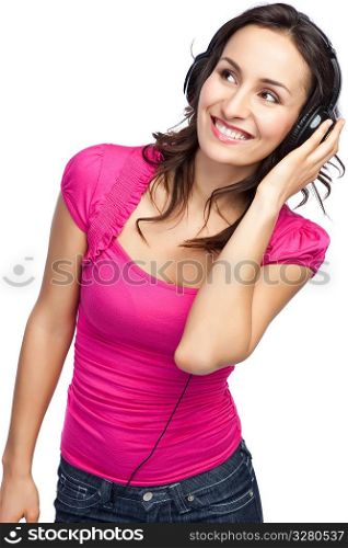 An isolated shot of a beautiful woman listening to music