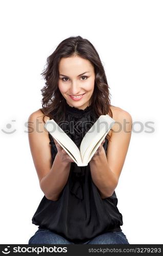 An isolated shot of a beautiful woman reading a book