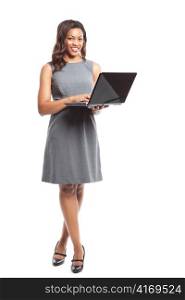 An isolated shot of a black businesswoman holding a laptop