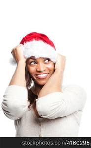 An isolated shot of a black woman celebrating christmas wearing santa hat
