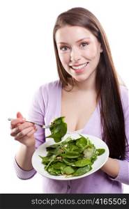 An isolated shot of a caucasian woman holding a plate of salad