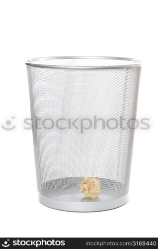 An isolated shot of a crumpled paper in a trash can