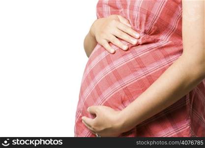 An isolated shot of a pregnant woman