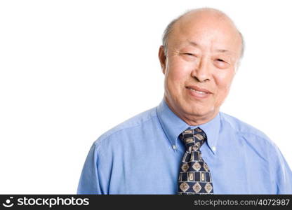 An isolated shot of a smiling senior asian businessman