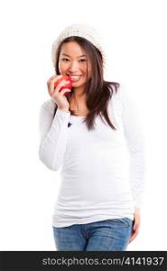 An isolated shot of an asian girl eating apple