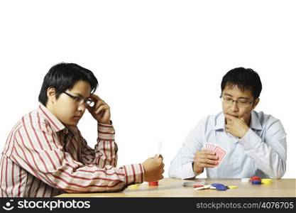 An isolated shot of two men playing poker
