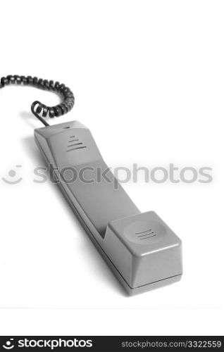 An isolated telephone handle on white