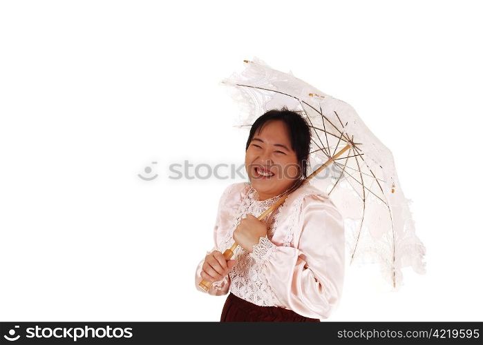 An Malayan woman with a embroidered sun-umbrella wearing a satinblouse, smiling into the camera for white background.